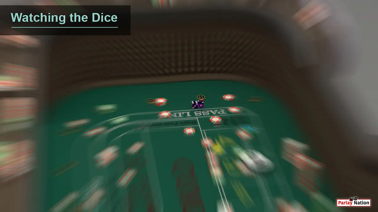 A player with tunnel vision staring at dice at the opposite end of a craps table.